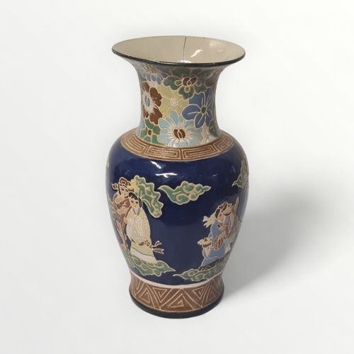 190 - Large Oriental pottery vase decorated with figures, 52cm high.