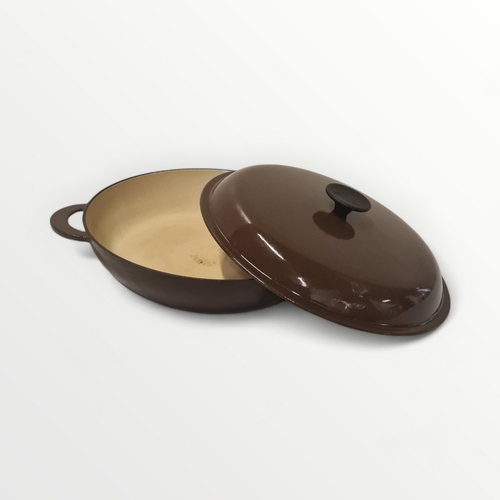 200 - Le Creuset brown enamelled lidded casseroledish, 30cm diameter. Shipping group (A).