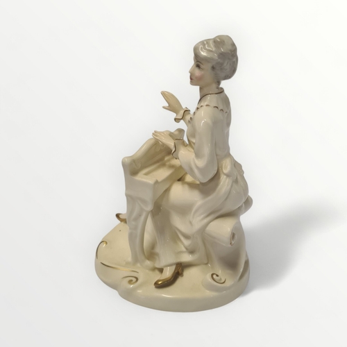 262 - Royal Doulton figure HN 2756 'Musicale' by Eric Griffiths, 23cm high. Shipping group (A).