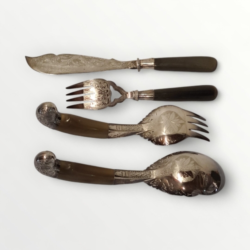 269 - Two pairs of horn handled food servers, the fancy ones probably .800 Philippine silver, 28cm long. S... 