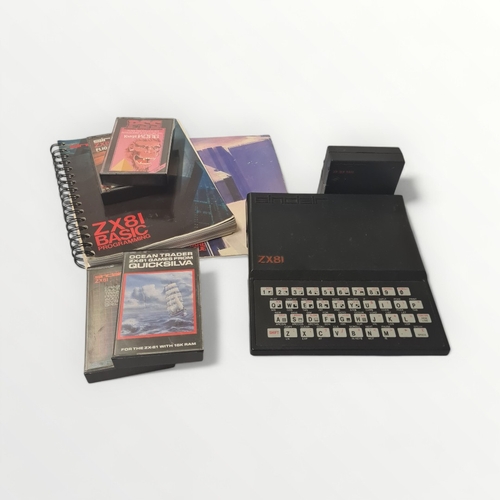 280 - Original Sinclair ZX81 home computer with manuals, memory expansion device and tape cassette program... 