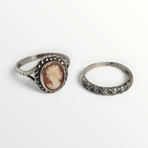 21 - Two 925 silver rings; A cameo ring size N, and a half eternity stone set ring, size J. Shipping grou... 