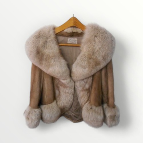 310 - Ladies light coloured short fur jacket with large collar and cuffs, labelled 'Springs of Blackpool' ... 