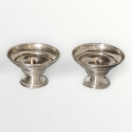 3 - Pair of sterling silver pedestal condiments, hallmark for Birmingham, 27g. Shipping group A.