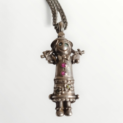 8 - Articulated silver rag doll pendant on silver chain. 12g. Shipping group (A).