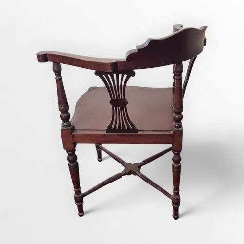 294 - Edwardian inlaid mahogany corner chair with horseshoe back, later adapted solid seat, four turned le... 