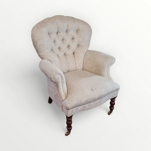 306 - Reproduction Victorian design upholstered button back arm chair in a flock damask material. 92cm ove... 