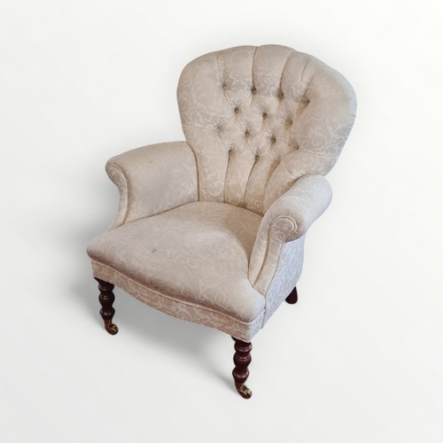 306 - Reproduction Victorian design upholstered button back arm chair in a flock damask material. 92cm ove... 