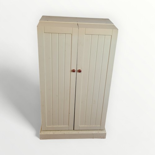 309 - Modern painted childs storage tower having twin fold out doors. 101 x 58cm.