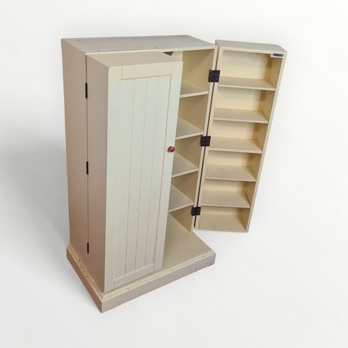 309 - Modern painted childs storage tower having twin fold out doors. 101 x 58cm.