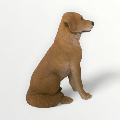 146 - Cast plastic seated model Labrador pup, 46cm tall. Shipping group (A).