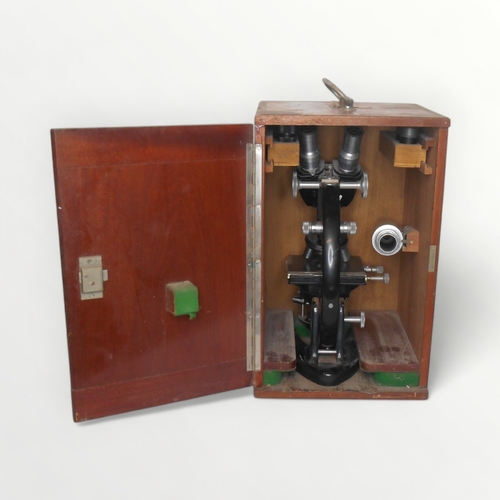 291 - C. Baker of London a binocular microscope with four lens turret and two way adjustable stage. Plano-... 