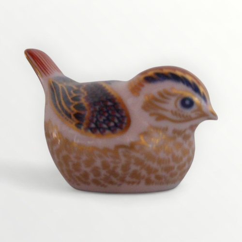 366 - Royal Crown Derby 'Goldcrest' paperweight with gold button, 5cm high. Shipping group (A).