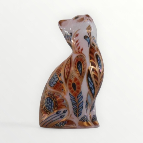 367 - Royal Crown Derby 'Small Seated Cat' paperweight with gold button, 9cm high. Shipping group (A).