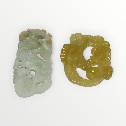 77 - Two hand-carved Chinese amulets. Shipping group (A).