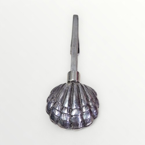 59 - Silver scallop napkin holder. Shipping group (A).