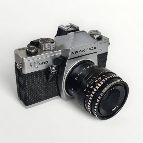 356 - Praktica Super TL1000 camera with case and a Praktica LTL3 camera with case. Shipping group (A).