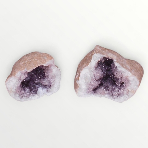 28 - Two piece purple geode rock sample, 7cm high. Shipping group (A).