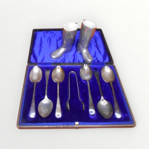 4 - Cased set silver spoons with nips and a pair of 'riding boot' posey holders, 9cm high. Shipping grou... 