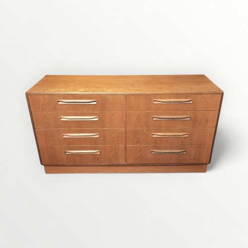 131 - G Plan teak eight drawer chest 76 x 142 x 45cm.