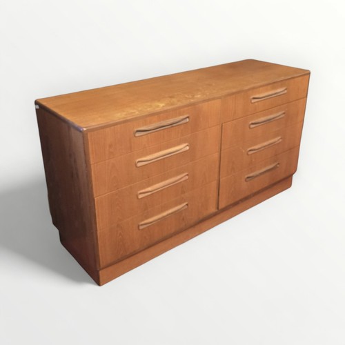 131 - G Plan teak eight drawer chest 76 x 142 x 45cm.