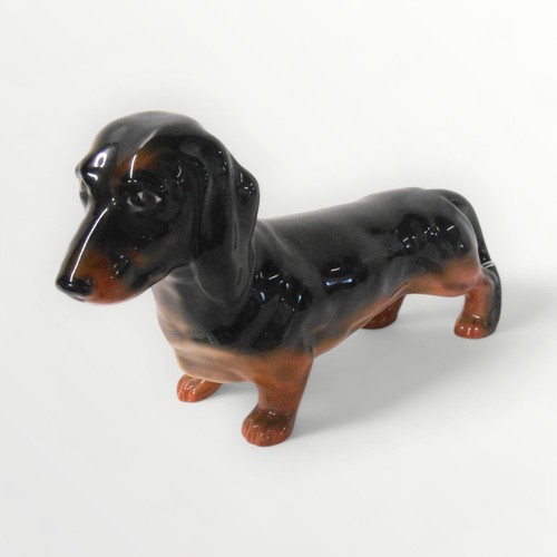 32 - Beswick model dachshund, 23cm nose to tail.Shipping group (A).