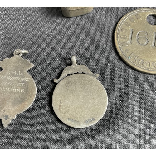 18 - Collection of Football Medals - together with a pocket compass, cased reading glasses and a minors t... 
