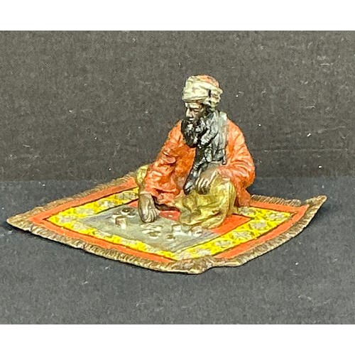 19 - Cold Painted Vienesse style Bronze of an Arab sat on a Rug- Early 20th Century

Postage band A