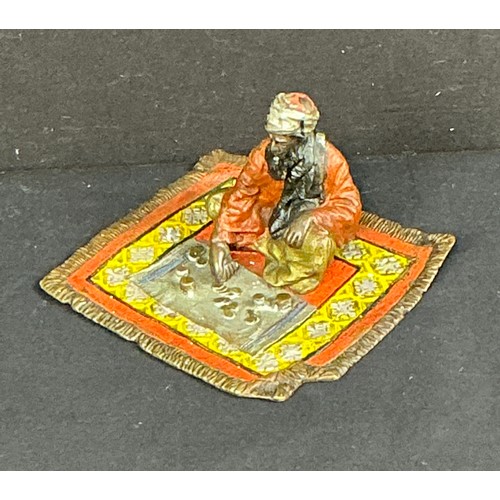 19 - Cold Painted Vienesse style Bronze of an Arab sat on a Rug- Early 20th Century

Postage band A