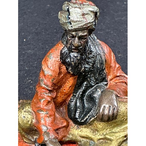 19 - Cold Painted Vienesse style Bronze of an Arab sat on a Rug- Early 20th Century

Postage band A