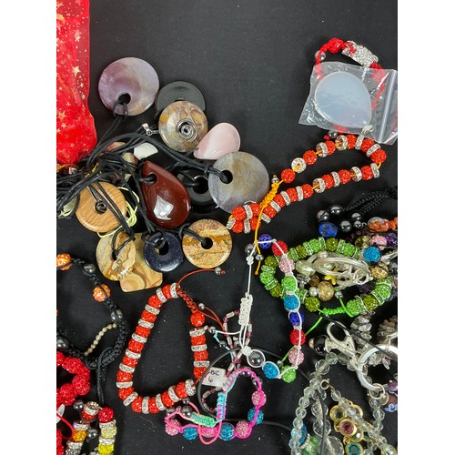 44 - Large Quantity of Costume Jewellery  - Mixture of stone and beads, mostly in necklaces and bracelets... 