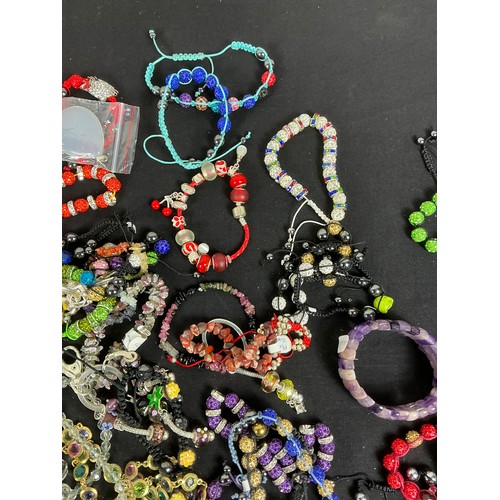 44 - Large Quantity of Costume Jewellery  - Mixture of stone and beads, mostly in necklaces and bracelets... 