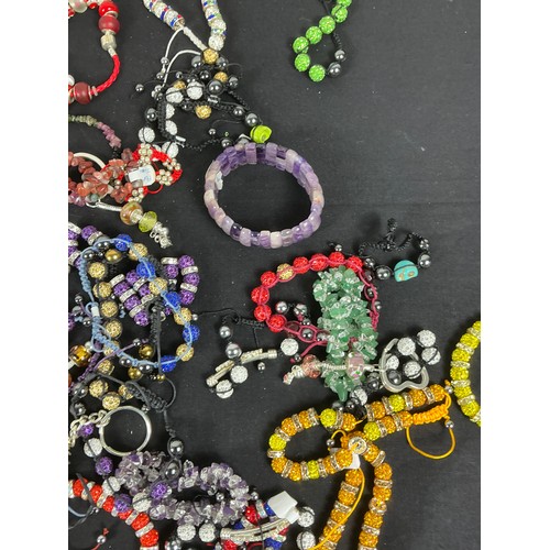 44 - Large Quantity of Costume Jewellery  - Mixture of stone and beads, mostly in necklaces and bracelets... 