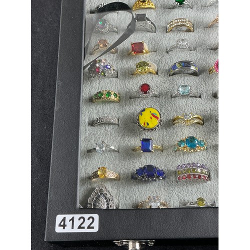 46 - Dealers Tray of Dress Rings - 100 rings of various designs and sizes. Gold and Silver tones with a v... 