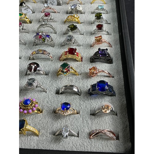 46 - Dealers Tray of Dress Rings - 100 rings of various designs and sizes. Gold and Silver tones with a v... 