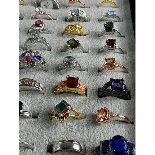 46 - Dealers Tray of Dress Rings - 100 rings of various designs and sizes. Gold and Silver tones with a v... 