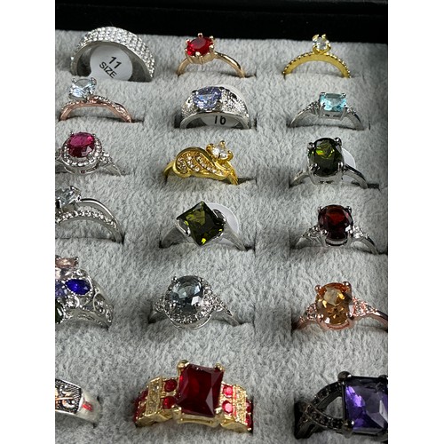 46 - Dealers Tray of Dress Rings - 100 rings of various designs and sizes. Gold and Silver tones with a v... 