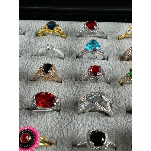46 - Dealers Tray of Dress Rings - 100 rings of various designs and sizes. Gold and Silver tones with a v... 