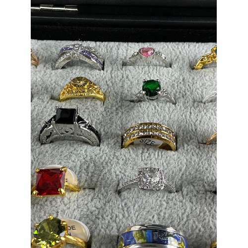 46 - Dealers Tray of Dress Rings - 100 rings of various designs and sizes. Gold and Silver tones with a v... 