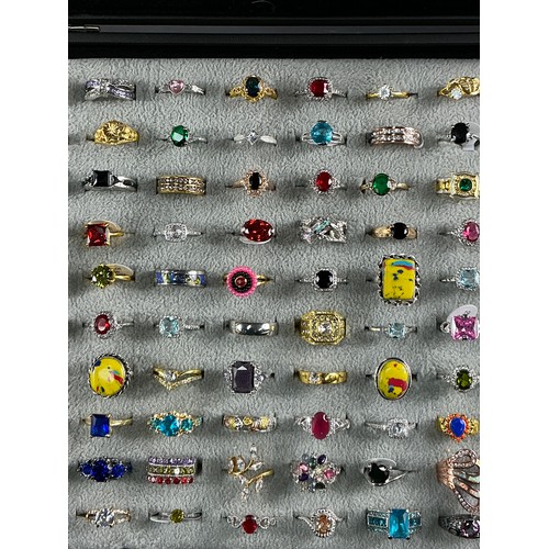 46 - Dealers Tray of Dress Rings - 100 rings of various designs and sizes. Gold and Silver tones with a v... 