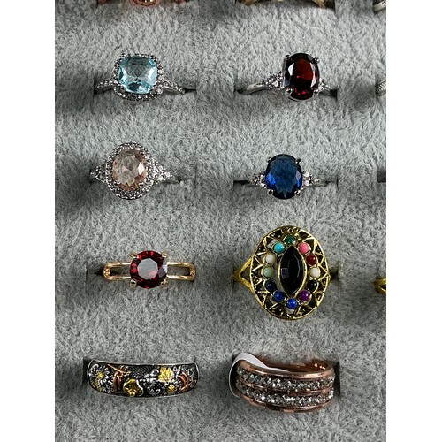 47 - Dealers Tray of Dress Rings - 100 rings of various designs and sizes. Gold and Silver tones with a v... 