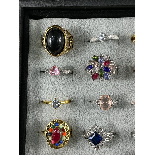 47 - Dealers Tray of Dress Rings - 100 rings of various designs and sizes. Gold and Silver tones with a v... 