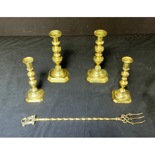 58 - Four Brass Candlesticks - together with toasting forks

Postage band B