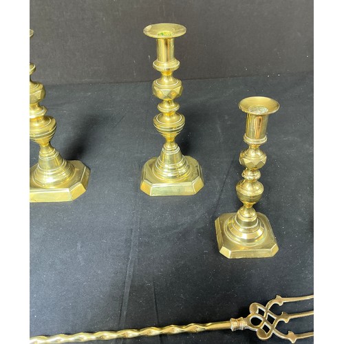 58 - Four Brass Candlesticks - together with toasting forks

Postage band B