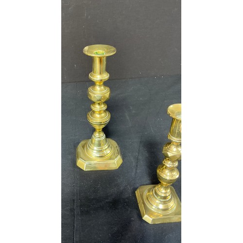 58 - Four Brass Candlesticks - together with toasting forks

Postage band B