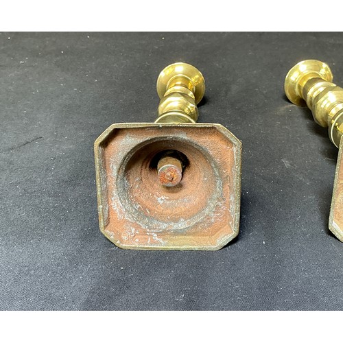 58 - Four Brass Candlesticks - together with toasting forks

Postage band B