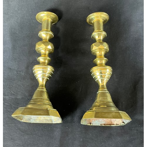58 - Four Brass Candlesticks - together with toasting forks

Postage band B