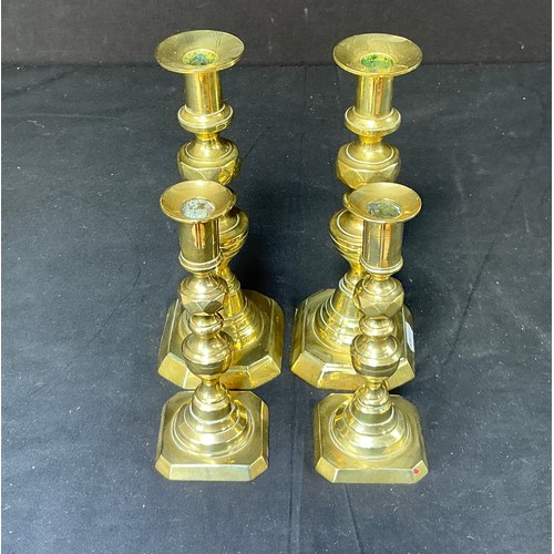 58 - Four Brass Candlesticks - together with toasting forks

Postage band B