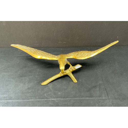 54 - Two Brass Supermarine Ash Trays - together with a large brass eagle

Postage band B