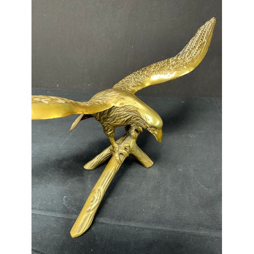 54 - Two Brass Supermarine Ash Trays - together with a large brass eagle

Postage band B